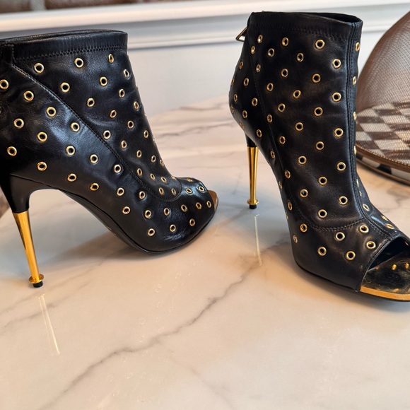 Tom Ford Black and Gold Grommet Heeled Boots with Metallic Stiletto. - Picture 4 of 7